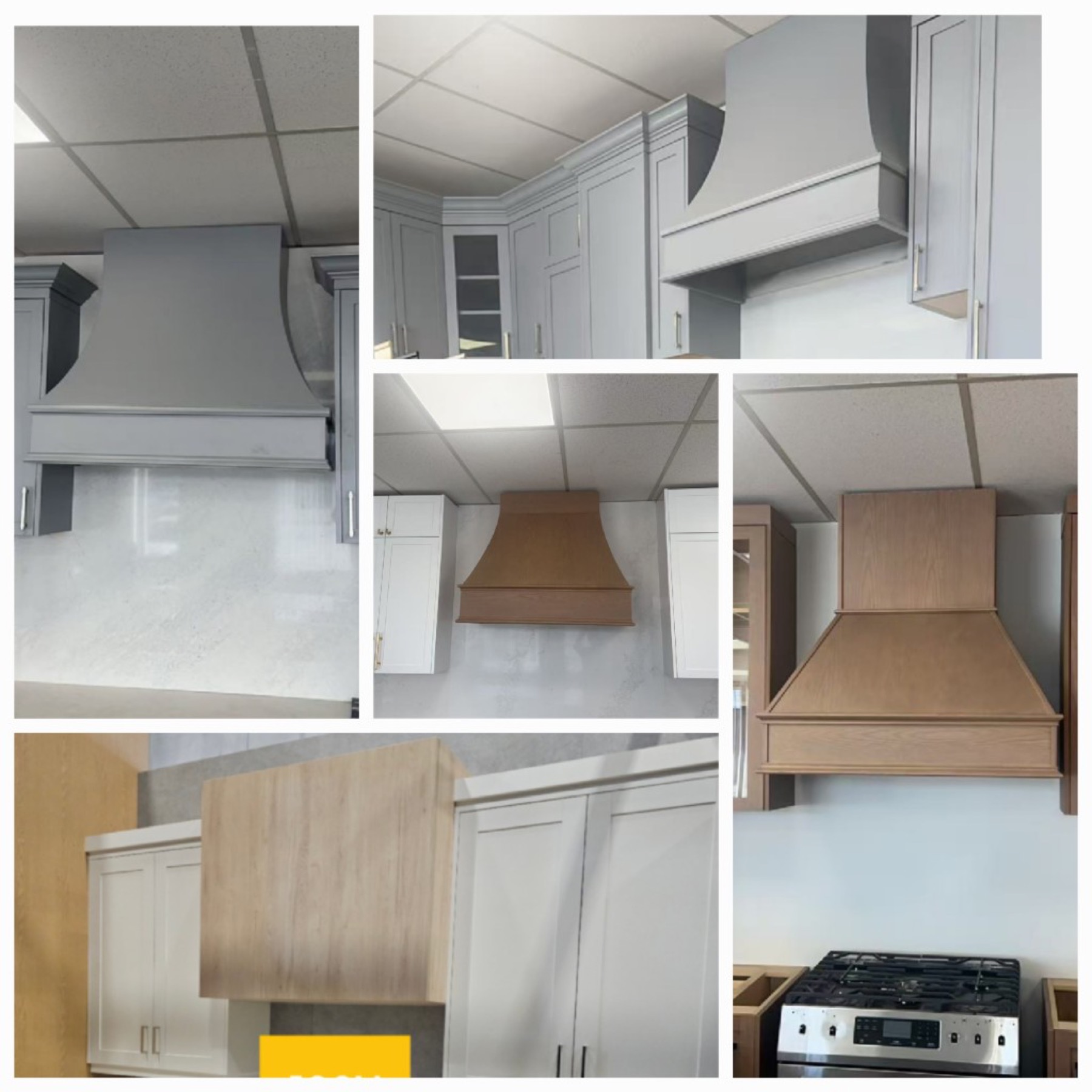 Showroom overview with white cabinets, wood island, and gold-veined stone
