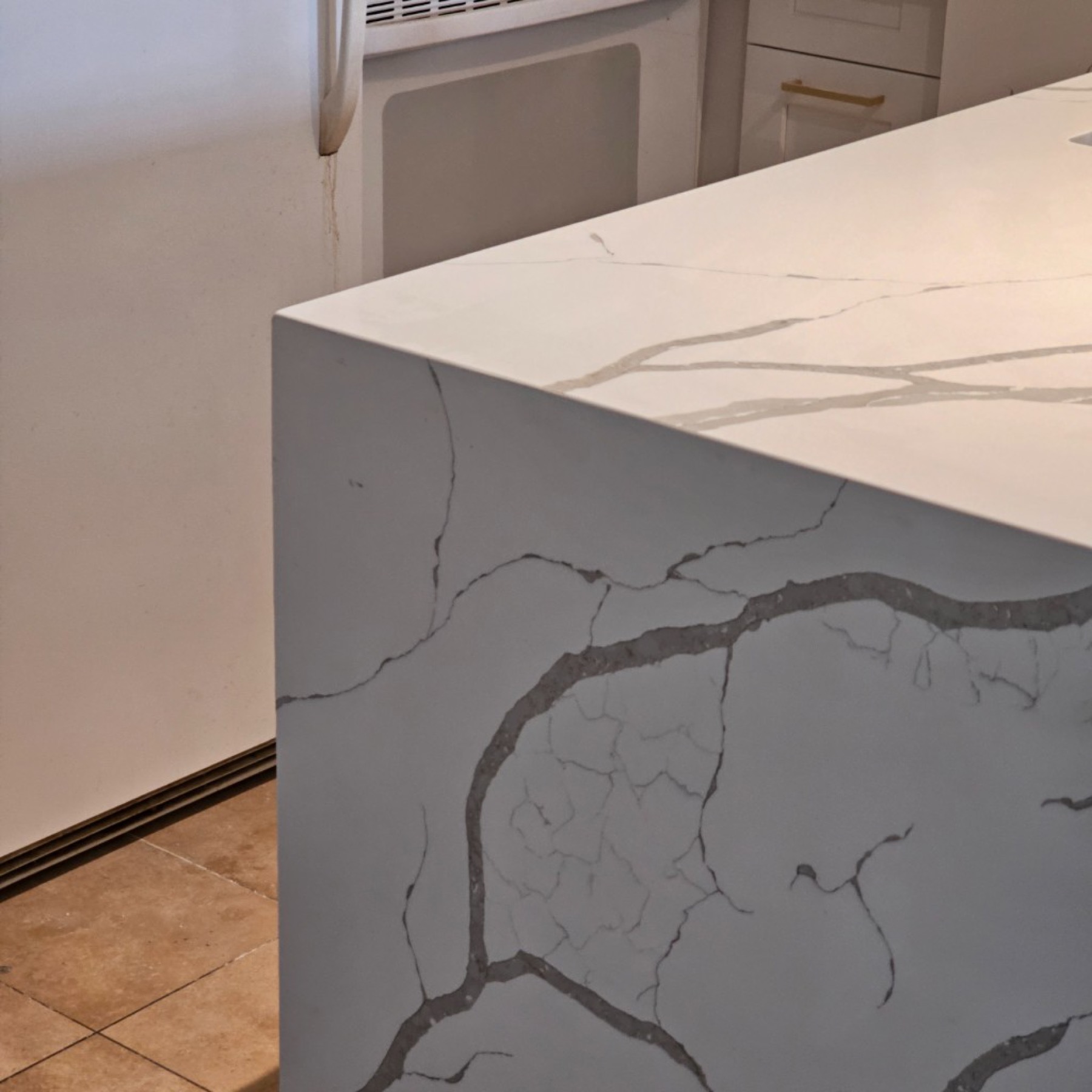 Corner glass cabinets with under-cabinet lighting