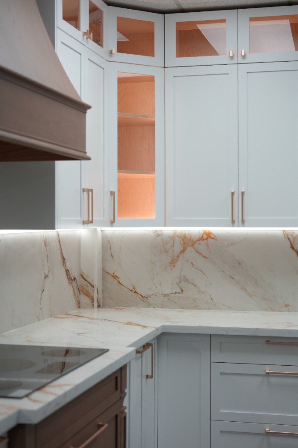 White shaker cabinets with gold hardware